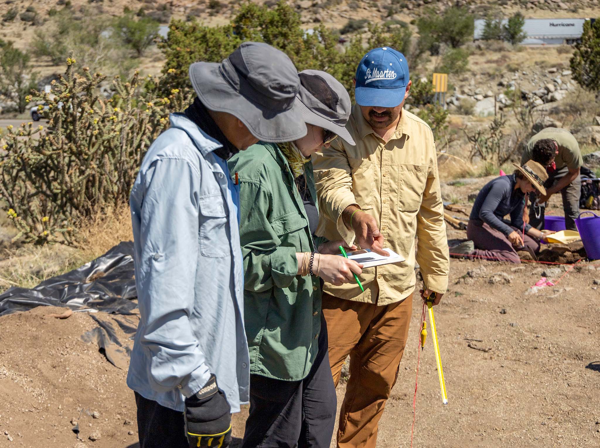 Group of people looking at notes
